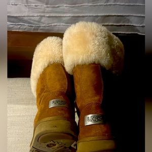 UGG tan and cream color boots